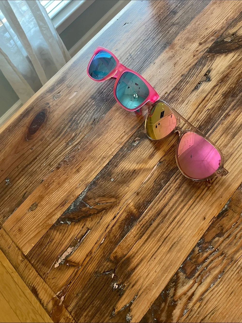 2 sunglasses Goodr and Blenders